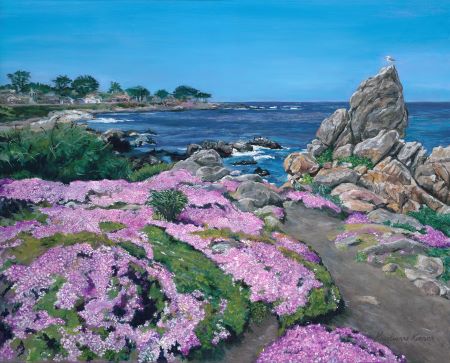 Rocky shoreline with purple flowers in foreground