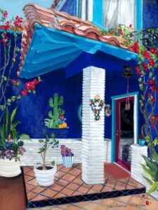 Porch with blue walls, flower pots, orange tile roof and cactus painting